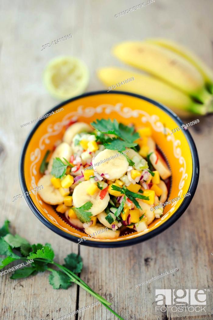 Stock Photo: Ceviche with bananas and mango.