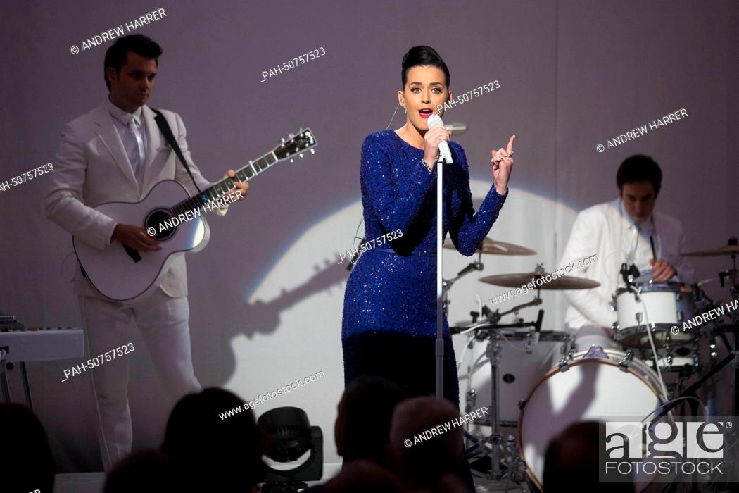 Stock Photo: Singer Katy Perry performs during a a concert commemorating the Special Olympics with United States President Obama in the State Dining Room of the White House.