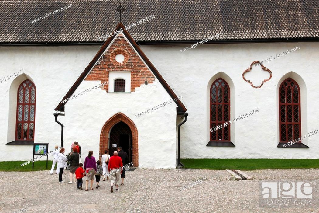 Stock Photo: Finland, Southern Finland, Eastern Uusimaa, Porvoo, Historic Porvoo Cathedral, Group at Entrance.