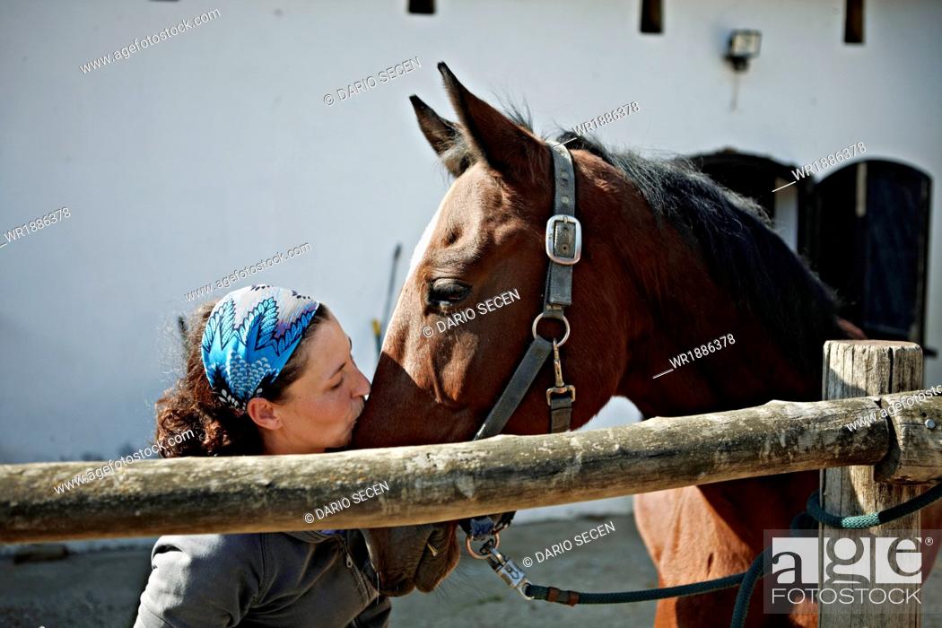 Stock Photo: Woman Kissing Horse, Portrait, Baranja, Croatia, Europe.