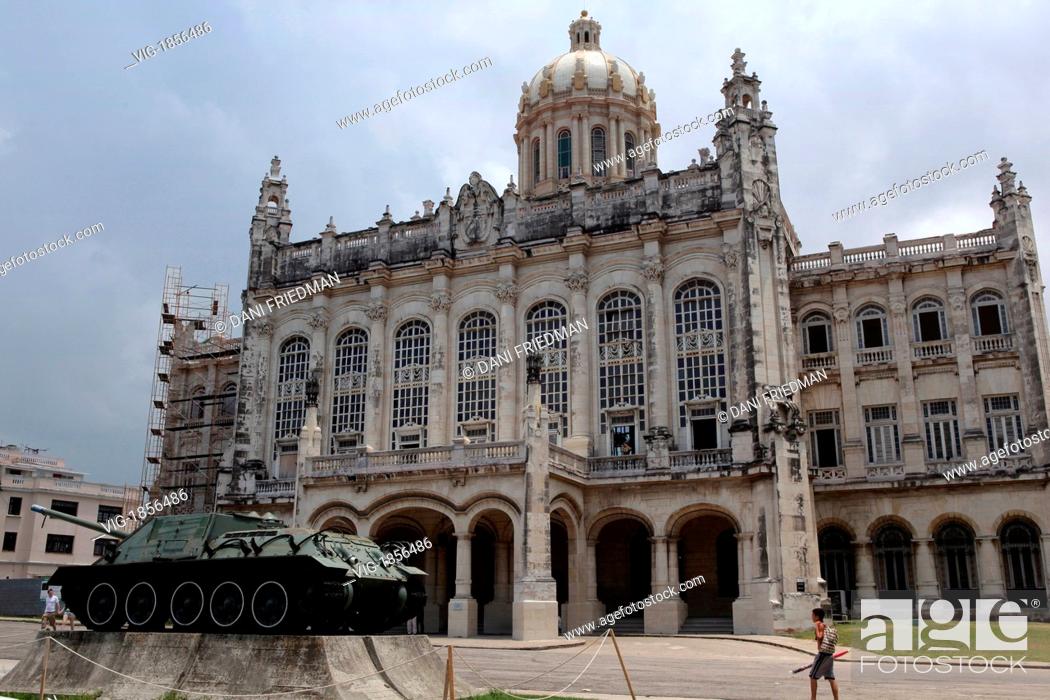 Stock Photo: CUBA, HAVANA, 06.07.2009, A war tank displayed outside the Museo de la Revolucion. This museum is located inside the former Presidential Palace.