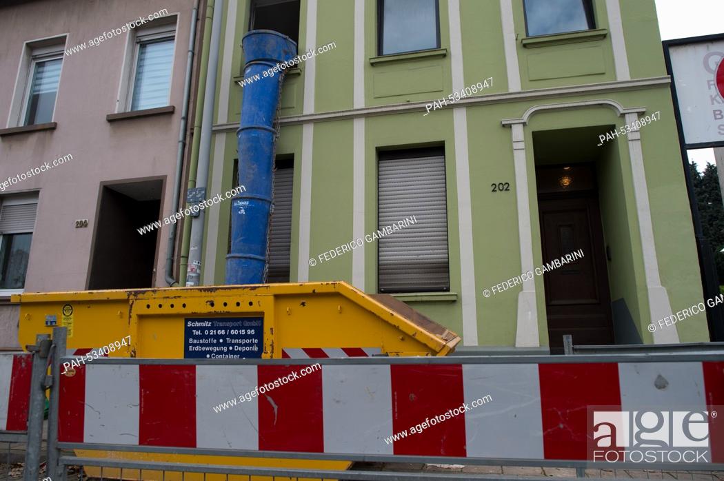 Stock Photo: A skip stands in front of the birth place of Nazi minister of propaganda Joseph Goebbels in Moenchenglasbach, Germany, 06 November 2014.