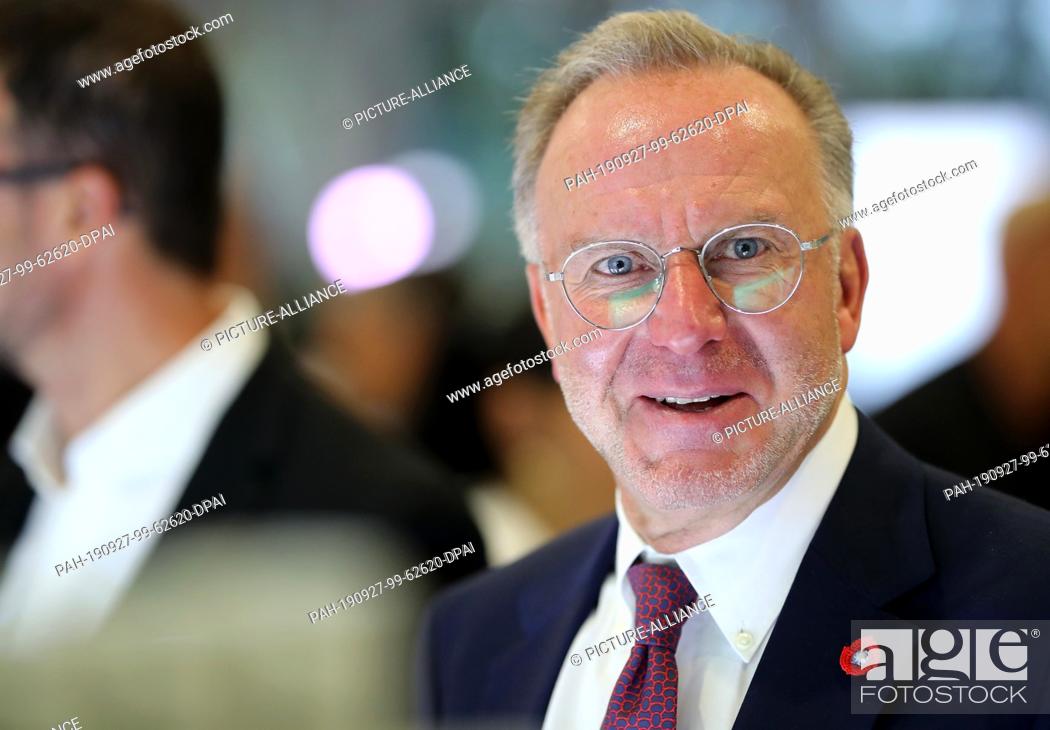 Stock Photo: HANDOUT - 27 September 2019, Hessen, Frankfurt/Main: Karl-Heinz Rummenigge, CEO of FC Bayern Munich, sits at the 43rd ordinary DFB Bundestag in the Congress.
