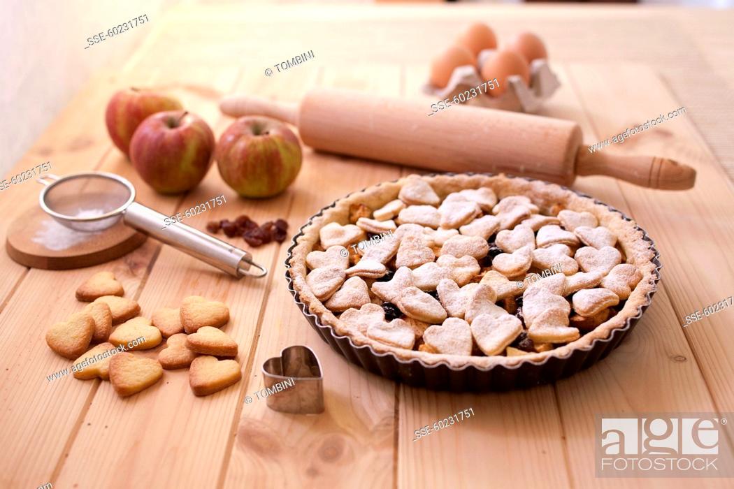 Stock Photo: Apple, raisin and shortbread heart pie.