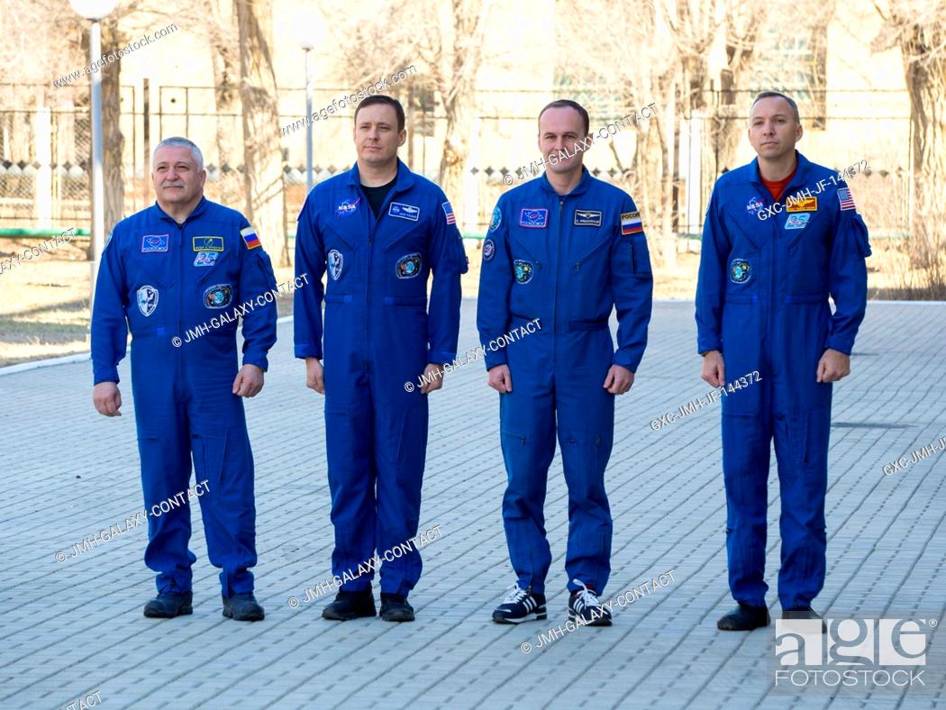 Stock Photo: At the Cosmonaut Hotel crew quarters in Baikonur, Kazakhstan, the Expedition 51 prime and backup crewmembers attend flag-raising ceremonies April 7 as part of.