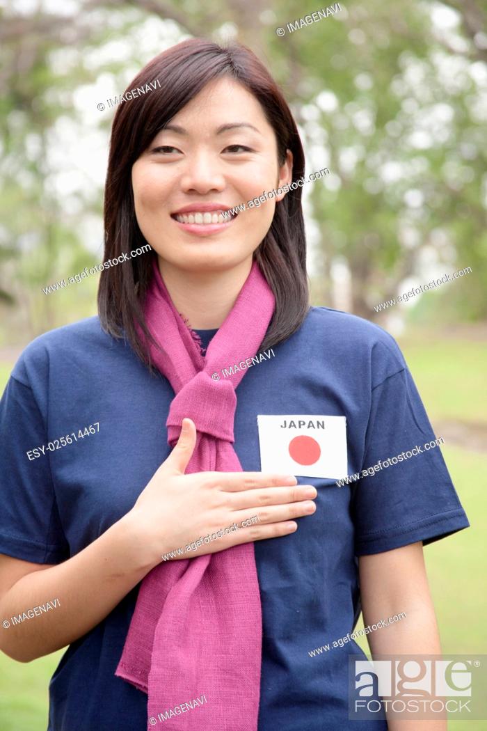 Stock Photo: Young woman supporting the Japan women's national football team.
