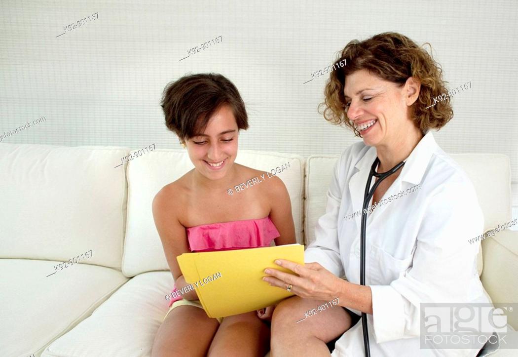 Stock Photo: Doctor and teenager.