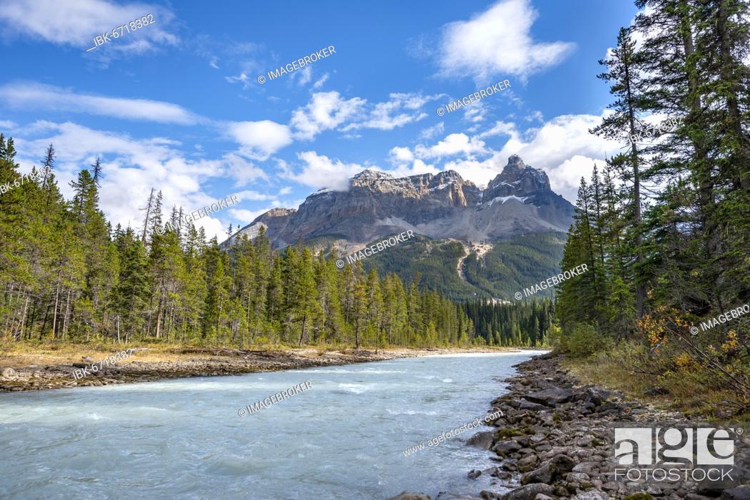 Stock Photo: River Kicking Horse River, in the back mountain range with mountain peak Cathedral Crags, Rocky Mountains, Yoho National Park, province Alberta, Canada.