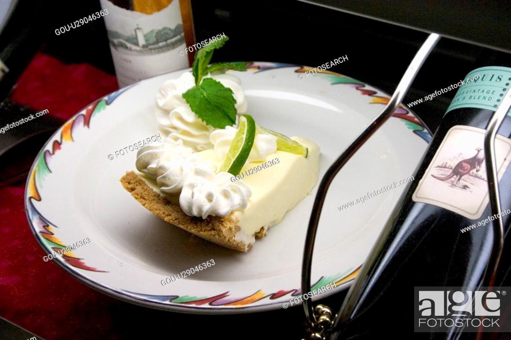 Stock Photo: Key lime pie served with dessert wine.