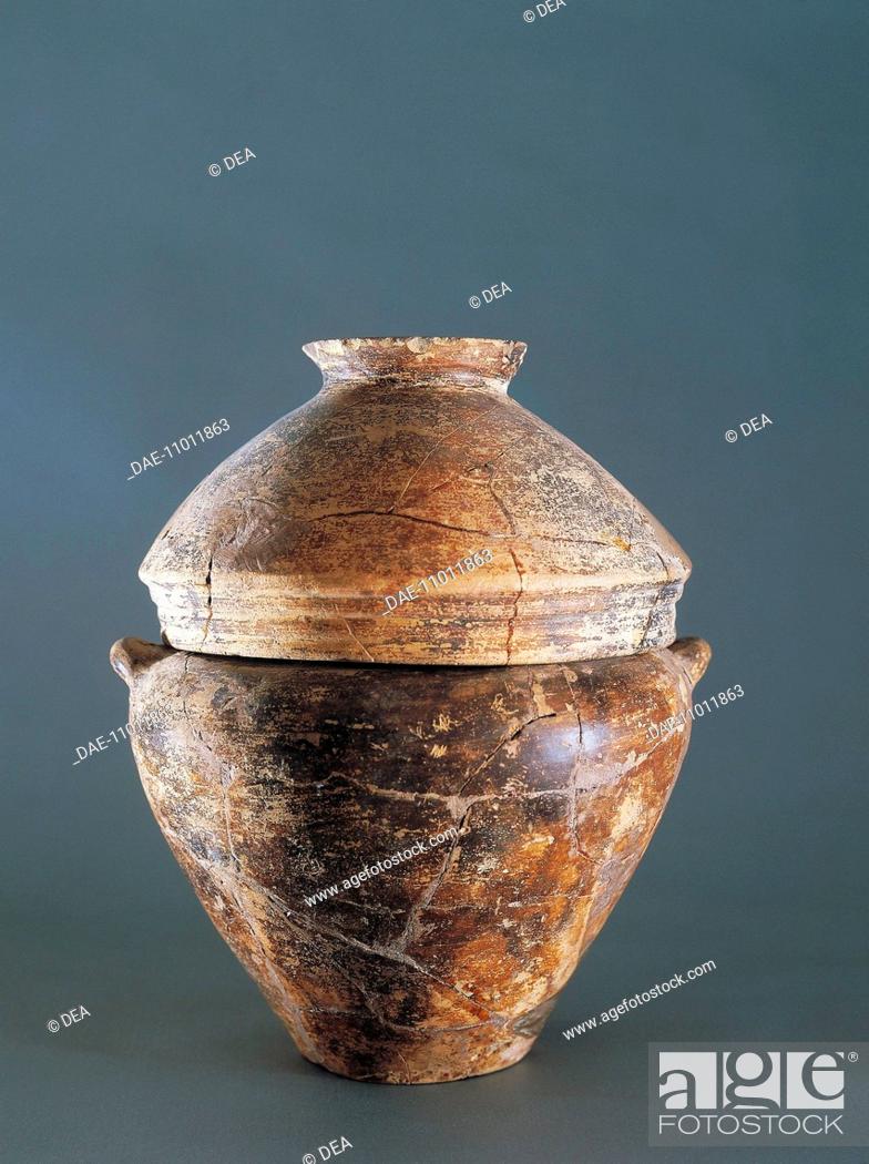 Stock Photo: Prehistory, Italy, Age of Iron, 6th century b.C. Culture of Golasecca, Urn with cover in the form of a bowl. From the Necropolis of Cà Morta, Como  Como.