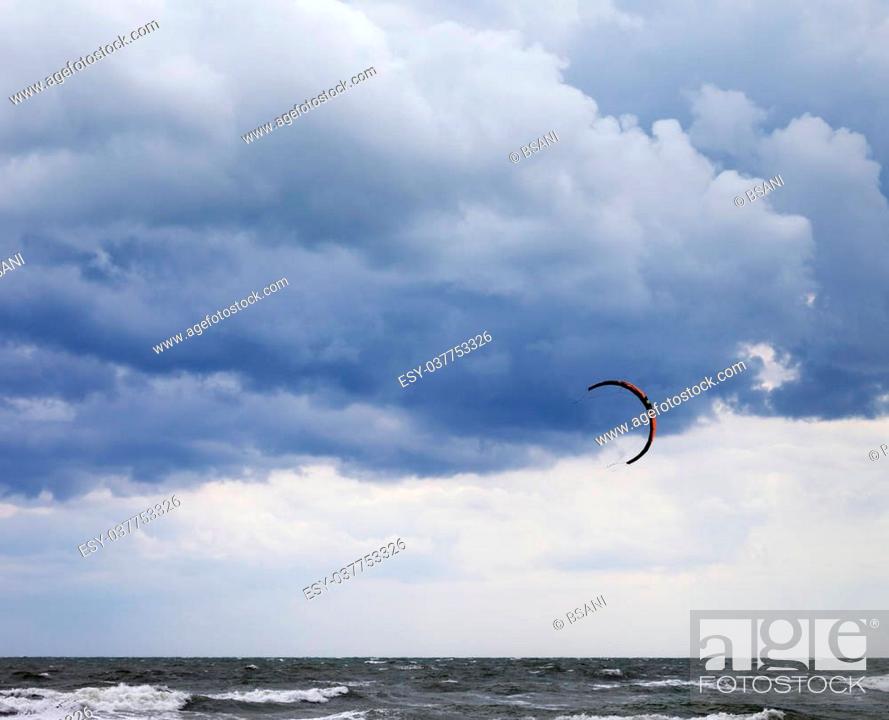 Stock Photo: Power kite in Black Sea and cloudy sky.