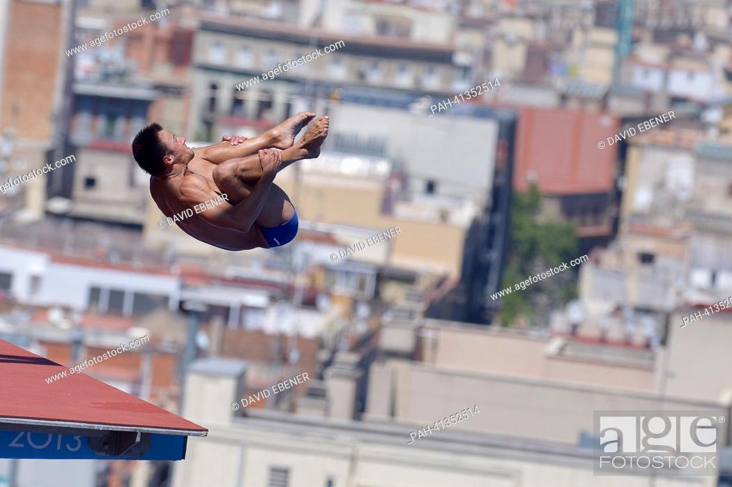 Stock Photo: Bronze medalist Sascha Klein of Germany in action during the men's 10m Platform diving final of the 15th FINA Swimming World Championships at Montjuic Municipal.