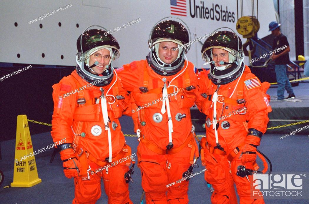Stock Photo: Astronaut Carl E. Walz (left), Expedition Four flight engineer, cosmonaut Yuri I. Onufrienko, mission commander, and astronaut Daniel W.