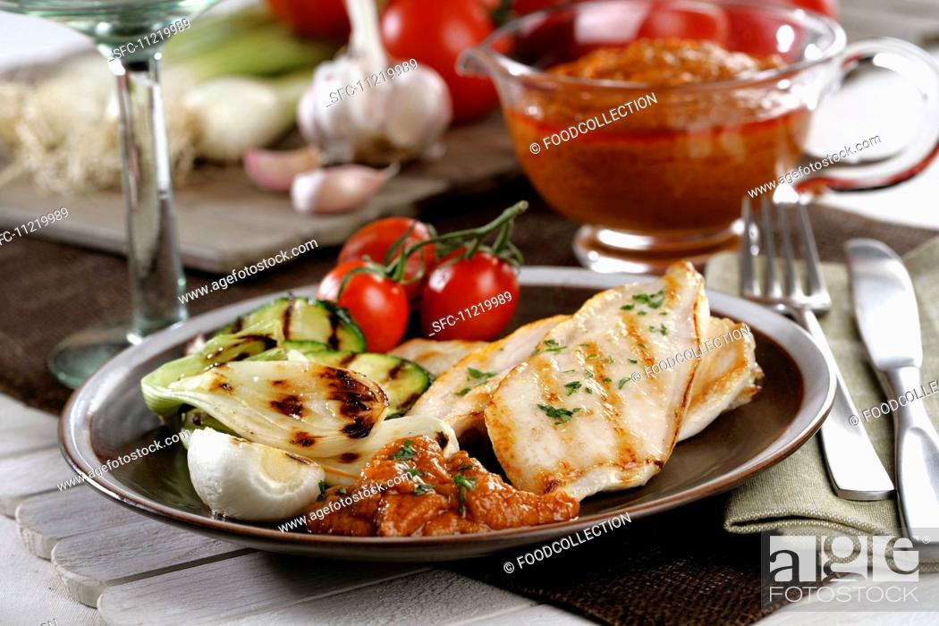 Stock Photo: Grilled chicken and vegetables with Romesco *** Local Caption *** Pollo a la parrilla con romesco y verduras.