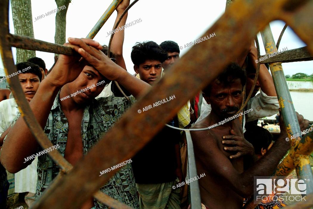 Stock Photo: The unemployed group There is no work for one month as everything is under water in the wet land Gaibandha, Bangladesh July 21, 2004.