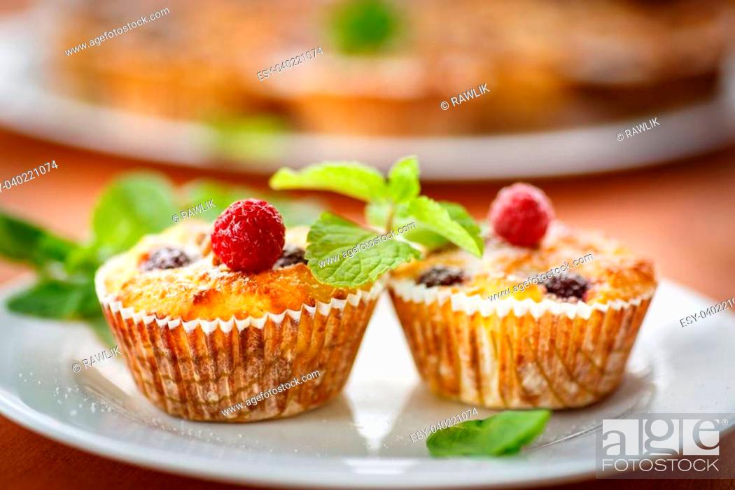 Stock Photo: Cheese Muffins with berries, nuts and mint.