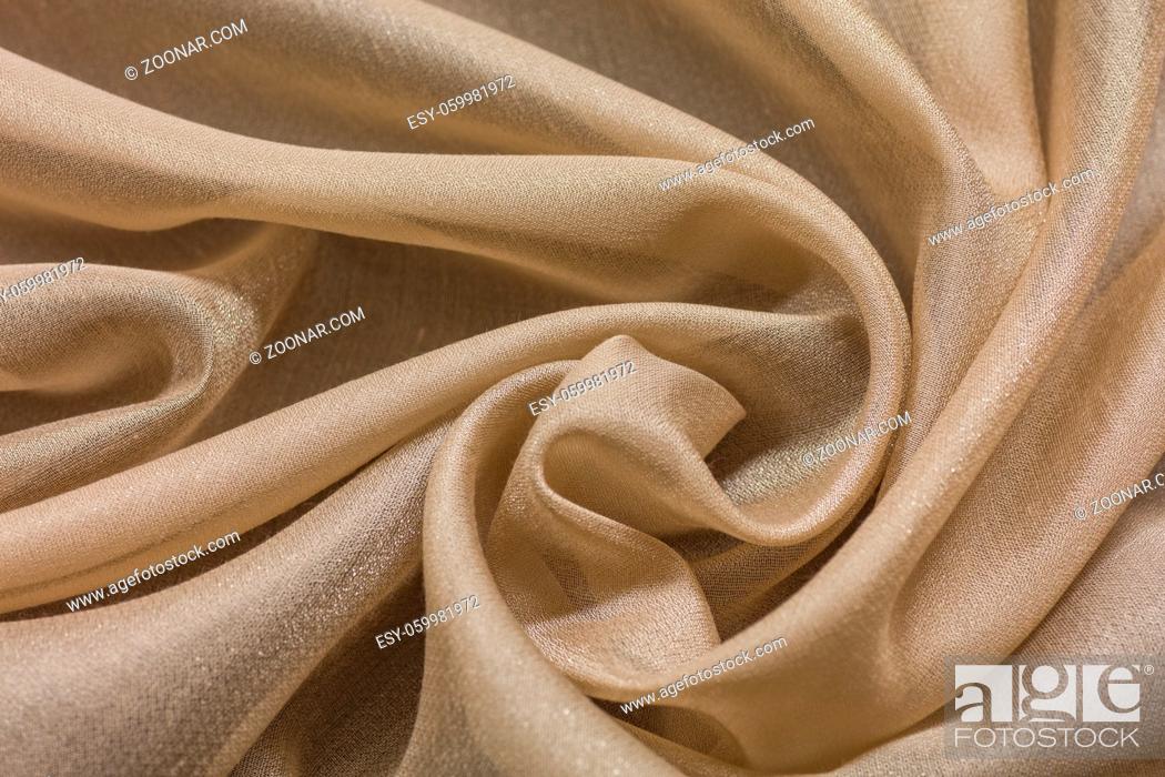 Stock Photo: Shiny cloth background with beige vial textile.