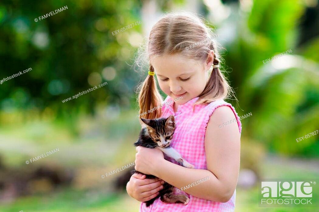 Child holding baby cat. Kids and pets. Little girl hugging cute little  kitten in summer garden, Stock Photo, Picture And Low Budget Royalty Free  Image. Pic. ESY-057827456 | agefotostock