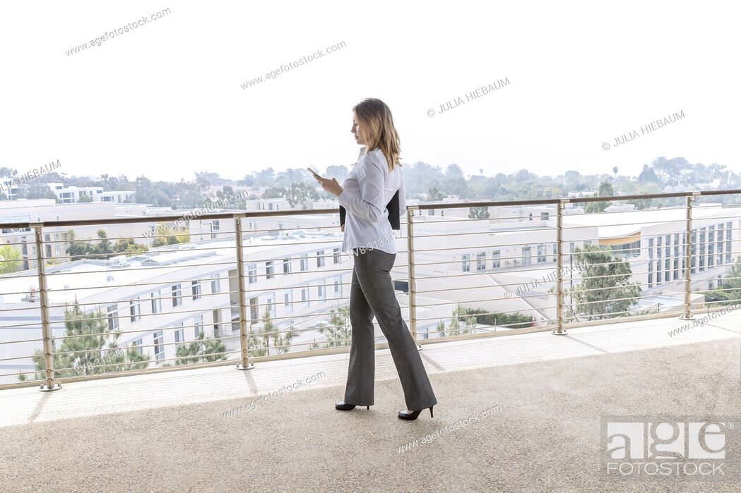 Photo de stock: Female manager checking her schedule.