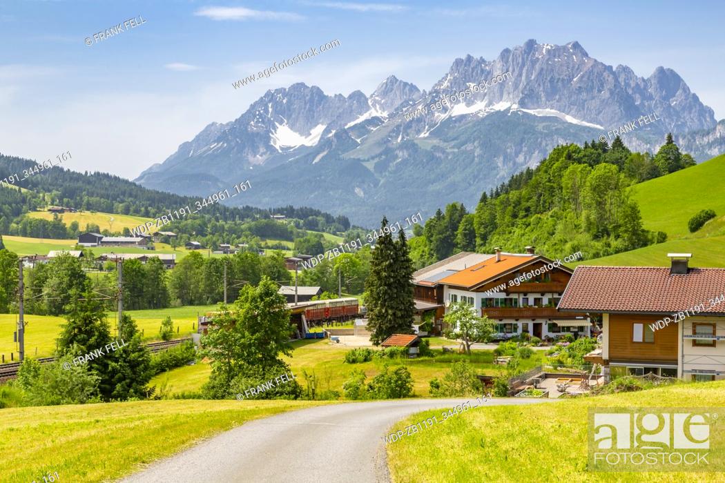 Stock Photo: View of trainline and Ellmauer Halt Mountain peak near St Johann, Austrian Alps, Tyrol, Austria, Europe.