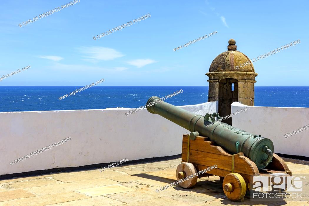 Stock Photo: Old historic fort and colonial guardhouse with cannon pointed to the sea in the city of Salvador in Bahia.