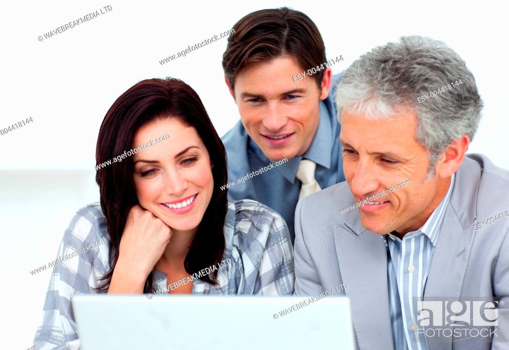 Stock Photo: Confident business partners working at a computer.