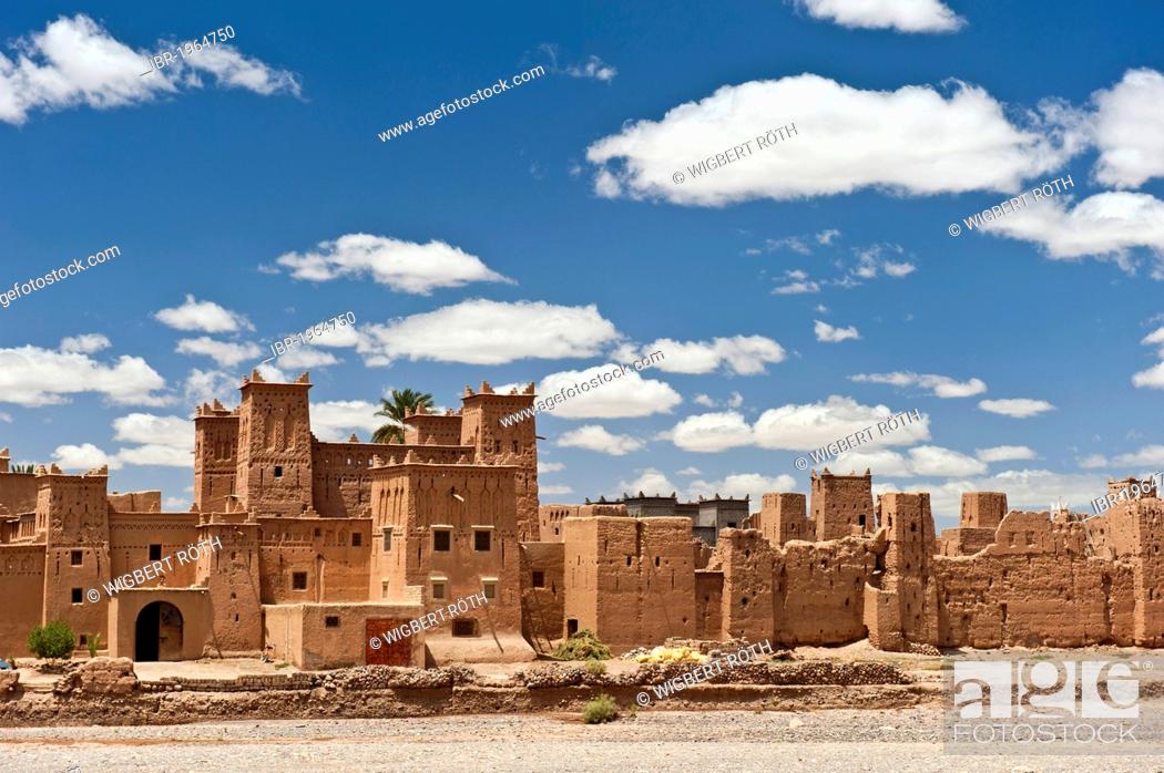 Stock Photo: Kasbah Amerhidil, Tighremt or Berber residential castle made from rammed earth in a dry river bed at Skoura, Lower Dades Valley, Kasbahs Route, southern Morocco.