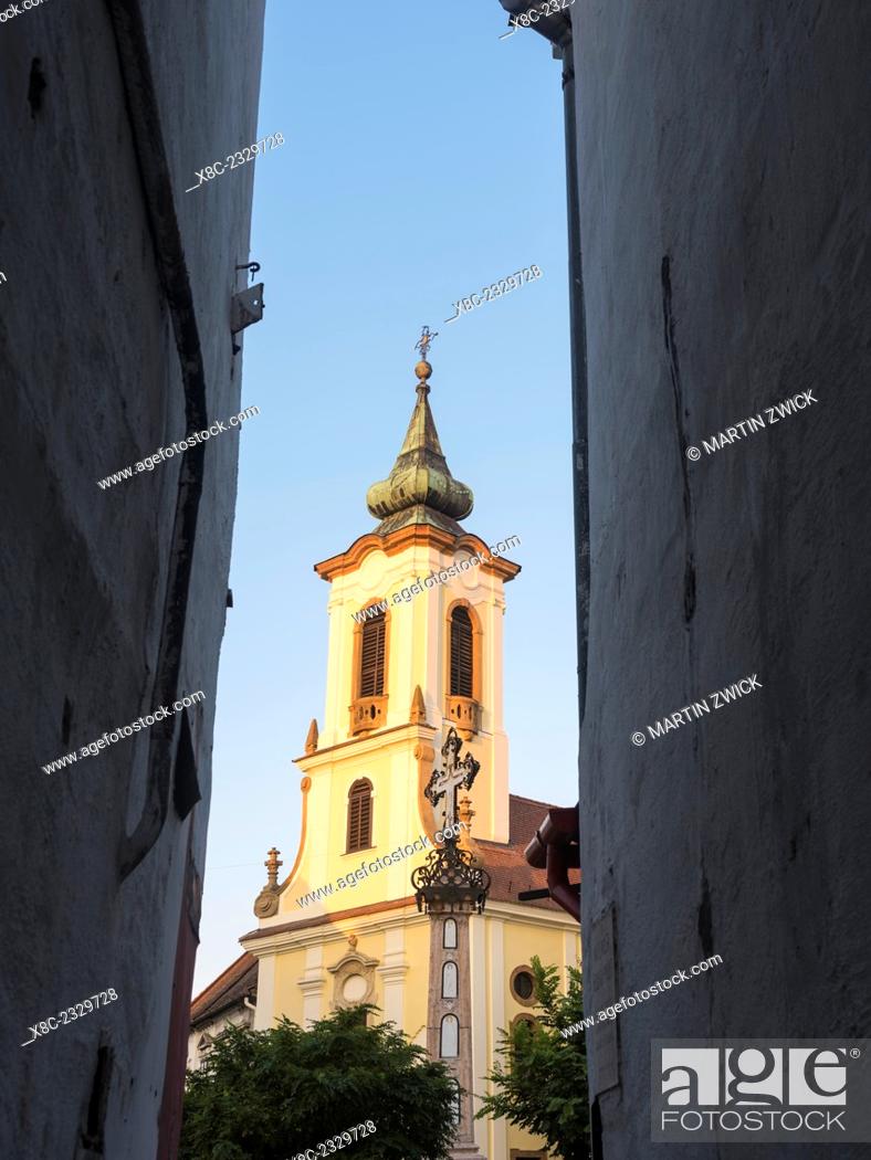 Stock Photo: Szentendre near Budapest, a historic small town on the banks of the Danube. Sunset at Foe Ter (mains square) in the old town with blagovescenska Church.
