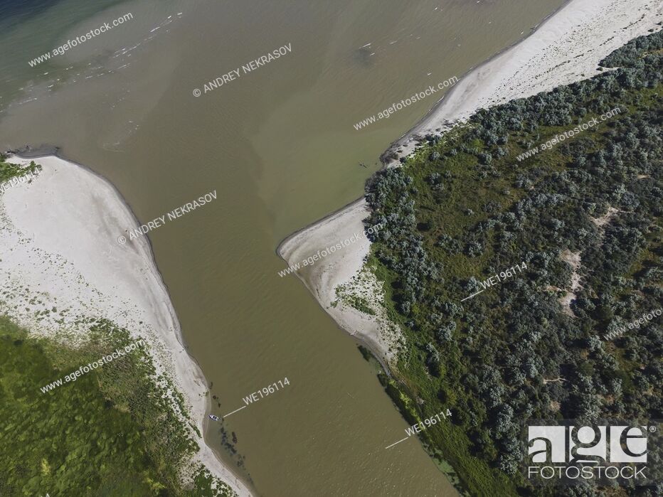Stock Photo: DANUBE DELTA, VYLKOVE, ODESSA OBLAST, UKRAINE - JULY 11-15, 2020: Aerial view on the Danube Biosphere Reserve in Danuble delta.