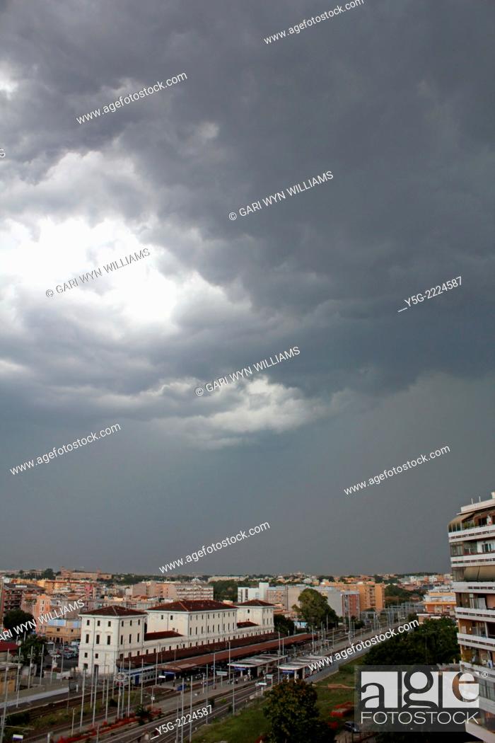 Stock Photo: Rome, Italy. 17th July 2014. Weather -Storm clouds over Rome, Italy.