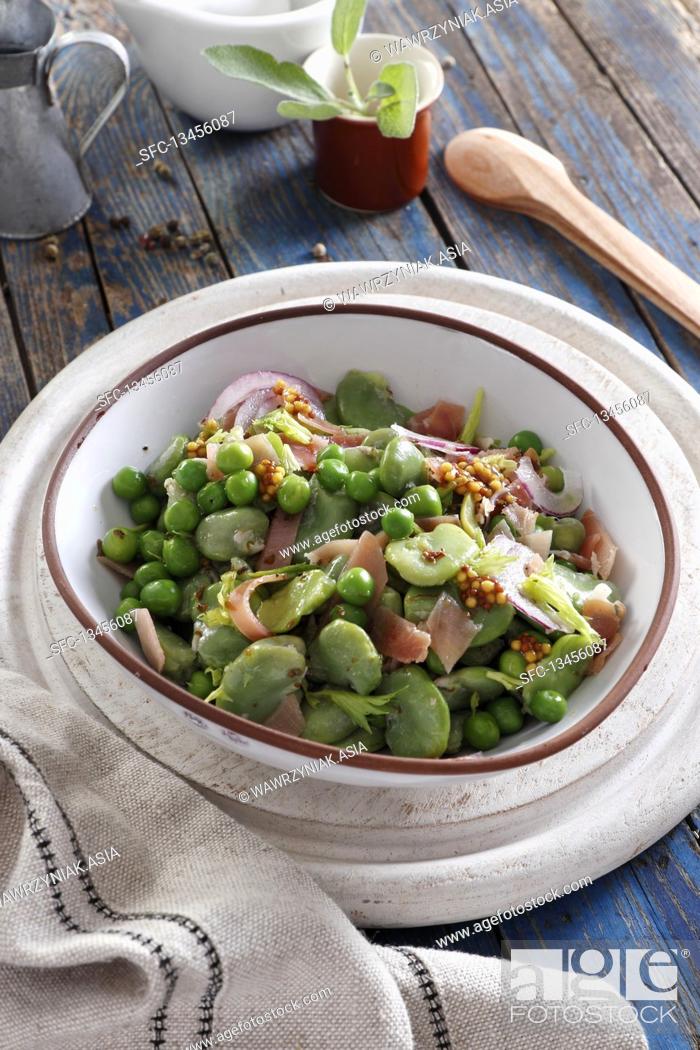 Stock Photo: Salad with broad beans, green peas and Parma ham.