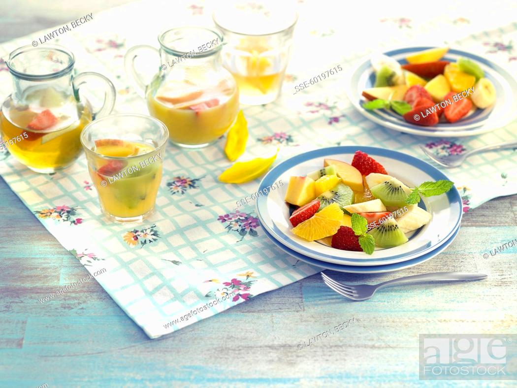 Stock Photo: Fruit salad and fruit juice.