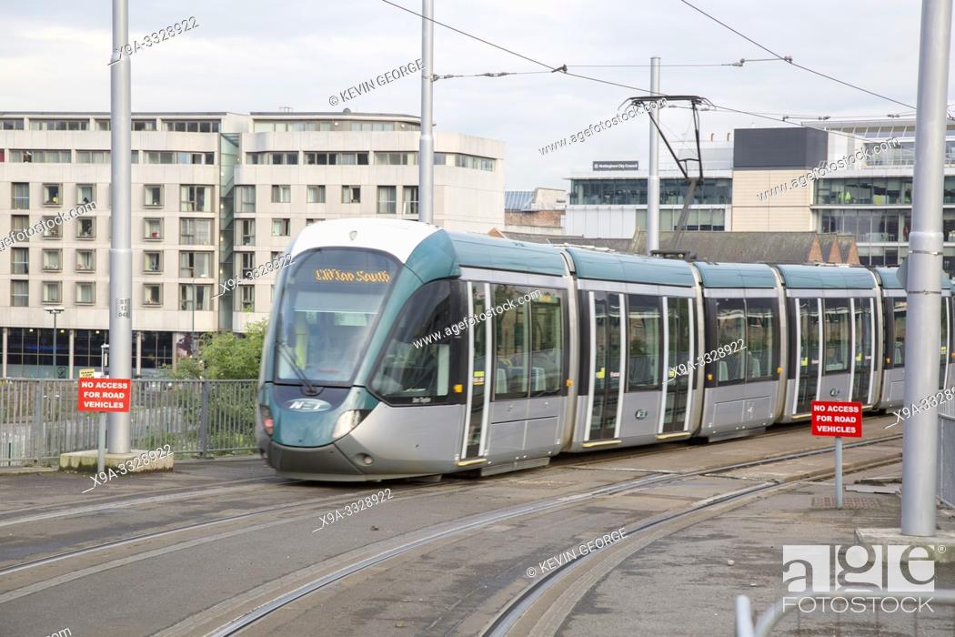 Stock Photo: Modern Tram Transport System near Weekday Cross Street; Nottingham, England; UK.