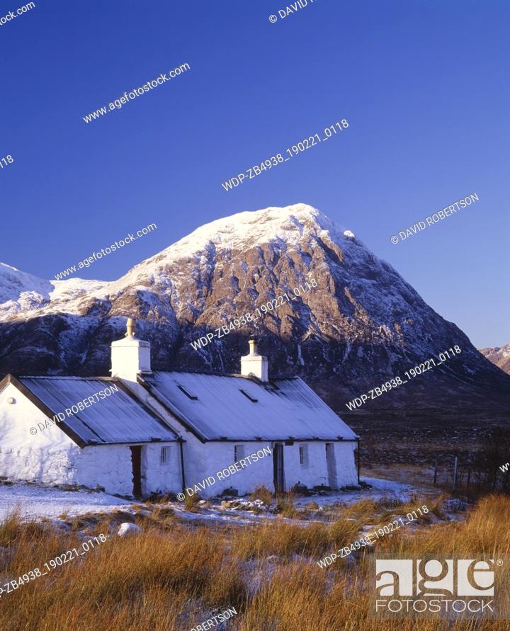 Stock Photo: Blackrock Cottage, Lochaber, Highland, Scotland. Buachaille Etive Mor in the background. This mountain stands at the edge of Rannoch Moor and at the heads of.