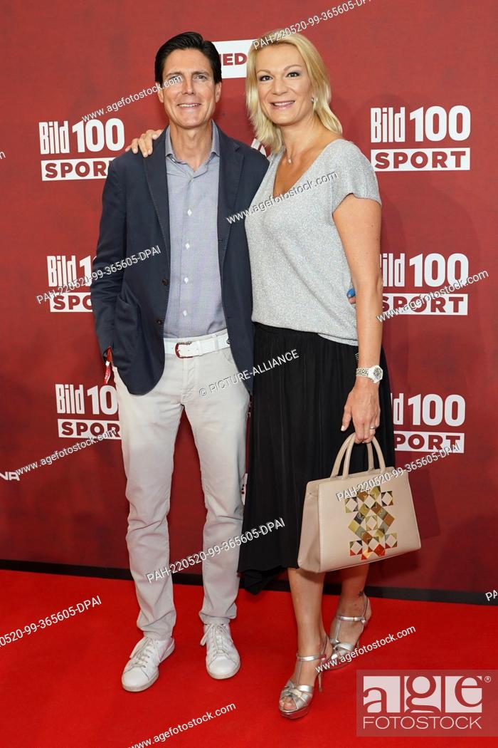 Stock Photo: 20 May 2022, Berlin: Marcus Höfl and former German ski racer Maria Höfl-Riesch are coming to the ""Bild100 Sport"" event.