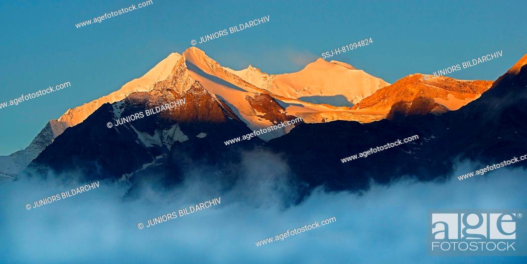 Stock Photo: Mountain peaks above the Mattertal in the first morning light: Weisshorn, Brunegghorn, Topali-Weisshorn and Bishorn. Valais, Switzerland.