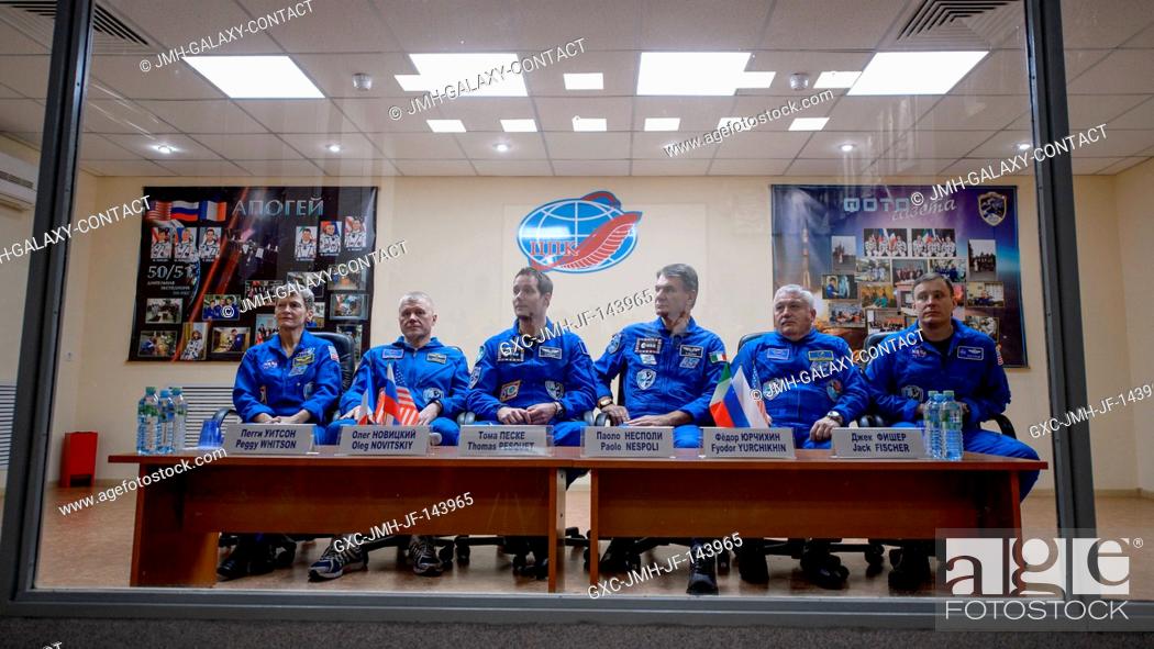 Stock Photo: Expedition 50 prime and backup crews are seen in quarantine behind glass during a crew press conference, from left, NASA astronaut Peggy Whitson.