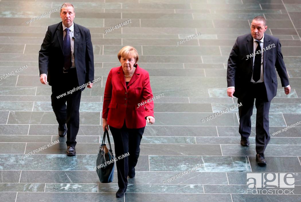 Stock Photo: German chancellor Angela Merkel arrives for further exploratory talks between the Christian Democrats and the Social Democrats in Berlin, Germany.