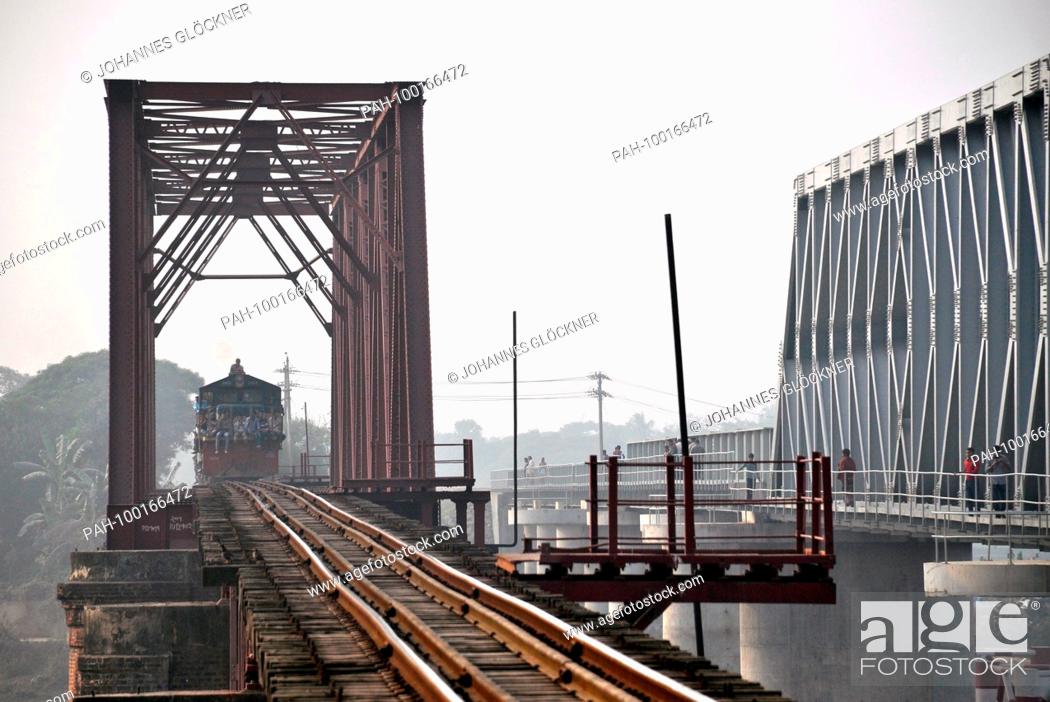 Stock Photo: Old and new railway bridge with train in Ghorashal near Narsingdi on 09.01.2015 - Bangladesh | usage worldwide. - Ghorashal/Dhaka/Bangladesh.