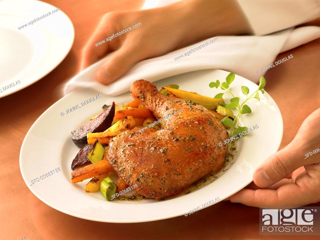 Stock Photo: Serving Roasted Chicken and Vegetables.