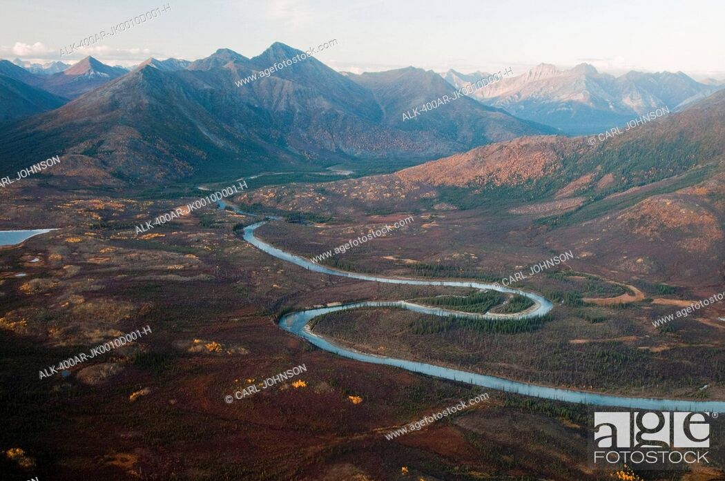 Stock Photo: Aerial view of the Kobuk River winding through Endicott Mountains in Gates of the Arctic National Park & Preserve, Arctic Alaska, Fall.