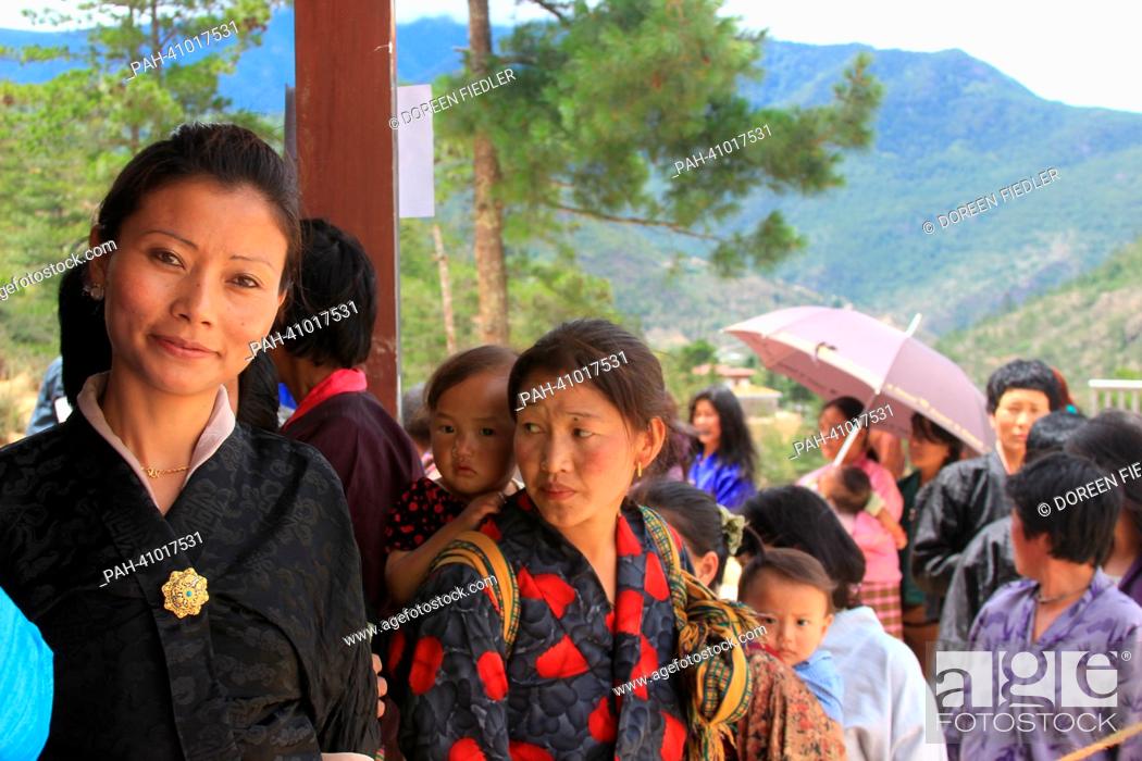 Stock Photo: Voters queue at the poll location in Wangsisina, a village near capital Thimphu, Bhutan, 13 July 2013. The small kingdom in the Himalaya elects a new parliament.