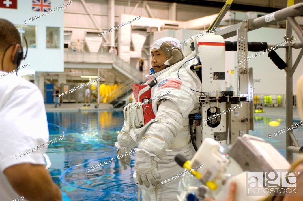 Stock Photo: Japan Aerospace Exploration Agency (JAXA) astronaut Koichi Wakata, Expedition 18 flight engineer, awaits the start of a training session in the waters of the.