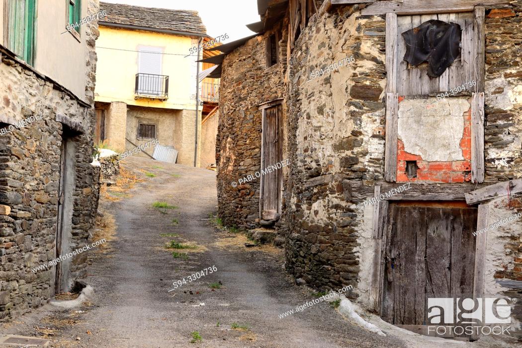 Stock Photo: Alley between old houses in Valencia do Sil, Orense, Spain.