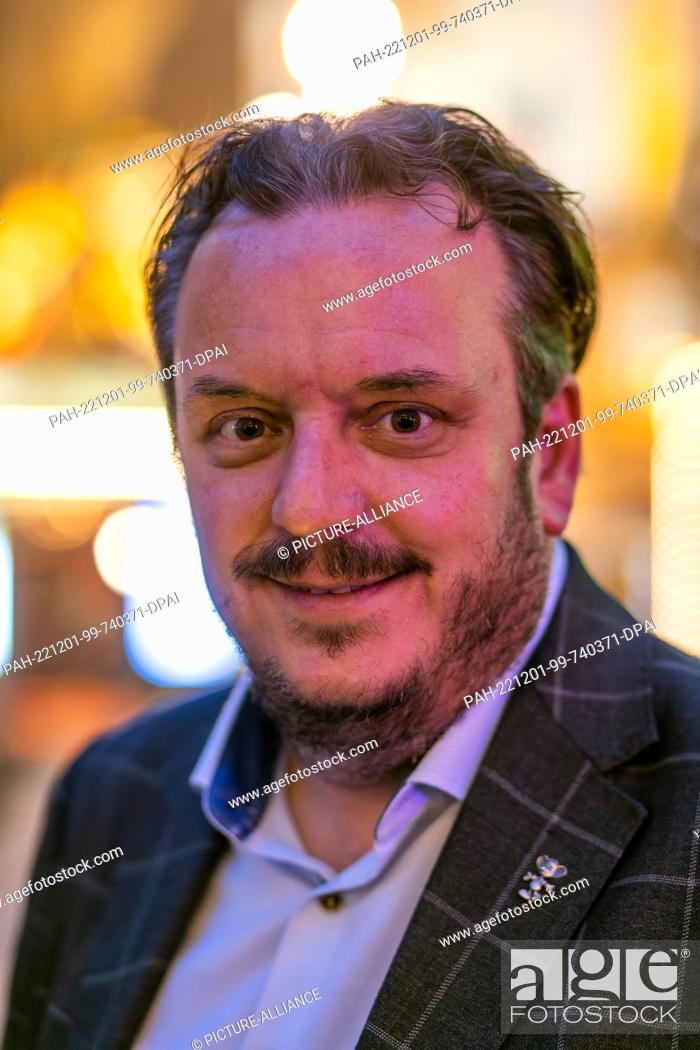 Stock Photo: PRODUCTION - 30 November 2022, Baden-Wuerttemberg, Rust: Michael Mack, managing partner of Europa-Park, stands in the French themed area of Europa-Park.
