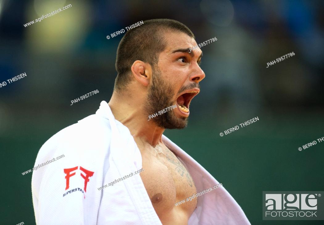 Stock Photo: Belgium's Toma Nikiforov (white) celebrates in the Men's -100kg Bronze Medal Final at the Baku 2015 European Games in the Heydar Aliyev Arena in Baku.