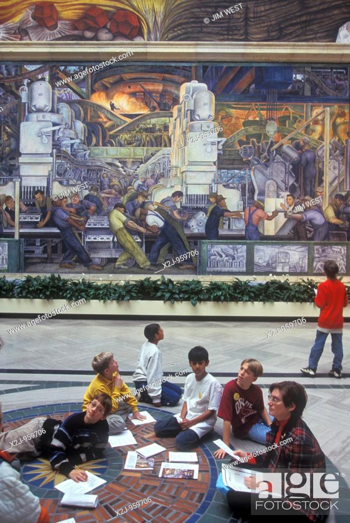 Stock Photo: Detroit, Michigan - Students from Okemos, Michigan study Diego Rivera's 'Detroit Industry' murals at the Detroit Institute of Arts  The famous Mexican muralist.