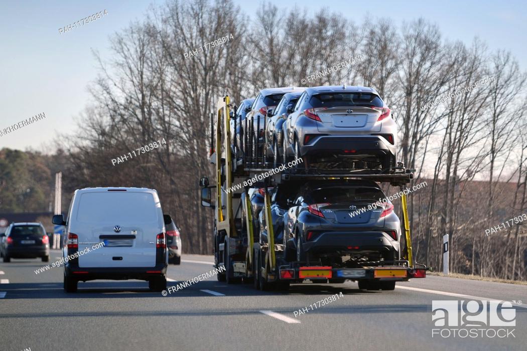 Stock Photo: Truck transports cars, car transport, road, car transporter, cars, overpass, new cars, Toyota. Car traffic, road traffic, goods traffic, A9 | usage worldwide.