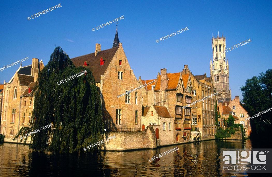 Stock Photo: Rozenhoedkaai. Canal, waterway. Houses by water. Belfort tower.