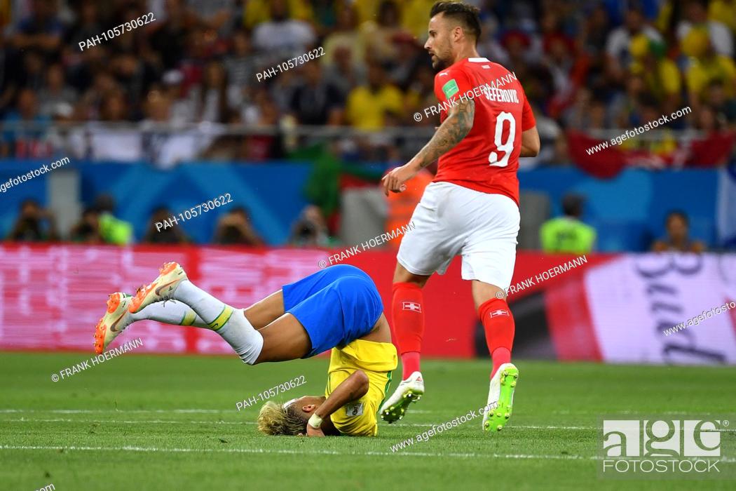 Stock Photo: NEYMAR (BRA) rolls off after action, duels with Haris SEFEROVIC (SUI), Brazil (BRA) -Swiss (SUI) 1-1, preliminary round, Group E, match 09, on 17.06.